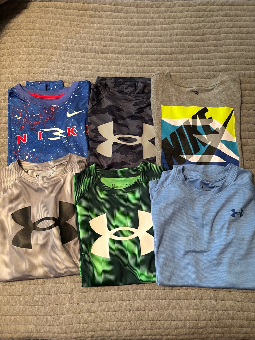 6 Nike and Under Amour shirts - Youth L